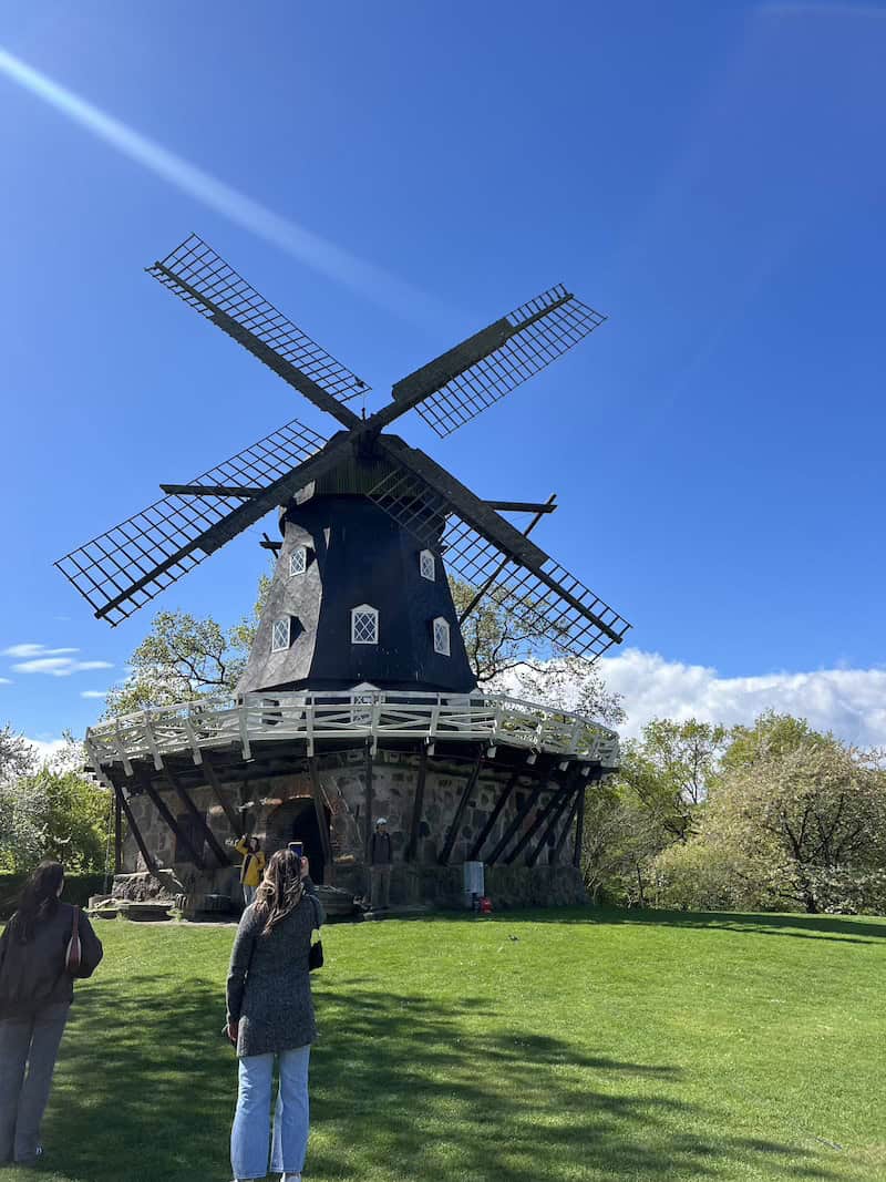 Traditional windmill in a Copenhagen park on a sunny day