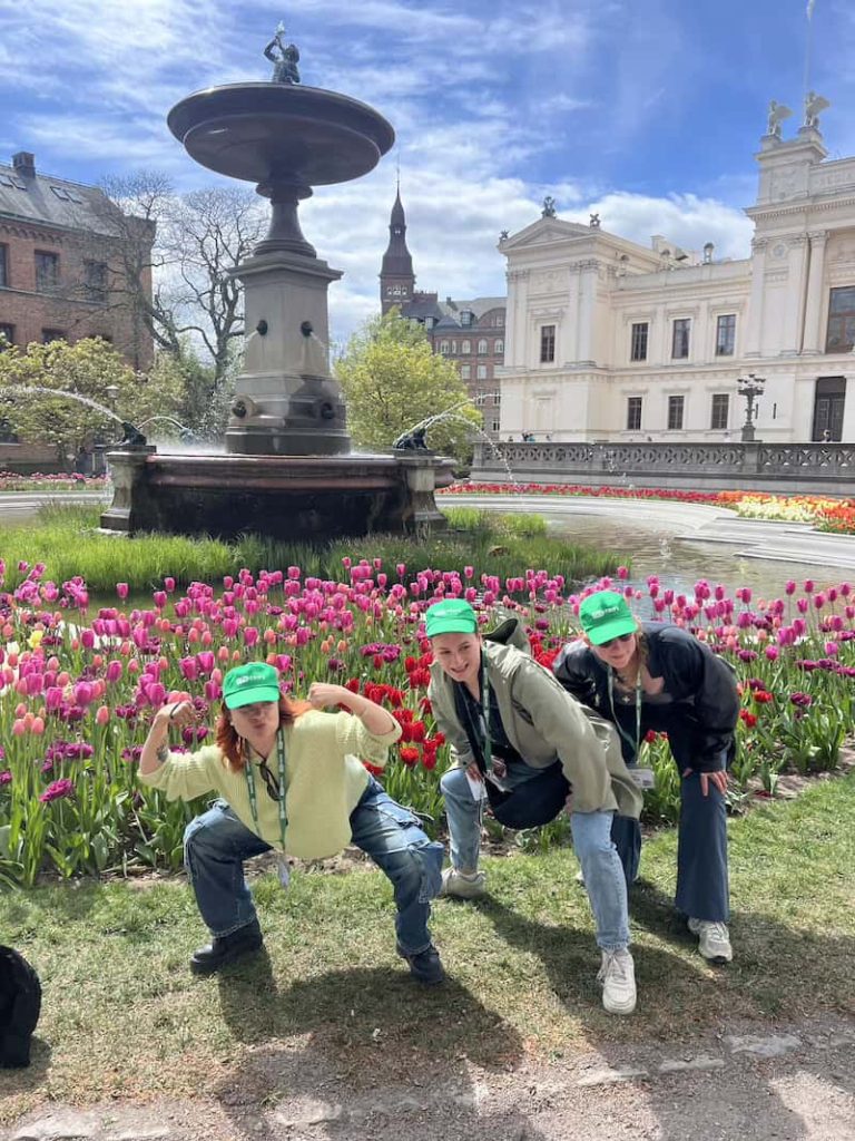 ESN NL to Copenhagen tour ESN students posing in a tulip garden in Copenhagen