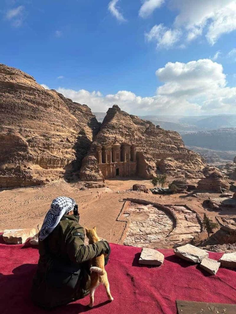 View of Petra’s ancient rock-cut ruins from a scenic viewpoint in Jordan’s UNESCO World Heritage Site.