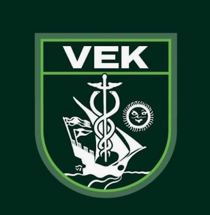 Emblem with 'VEK' text, a ship, Caduceus, and sun on dark green background.